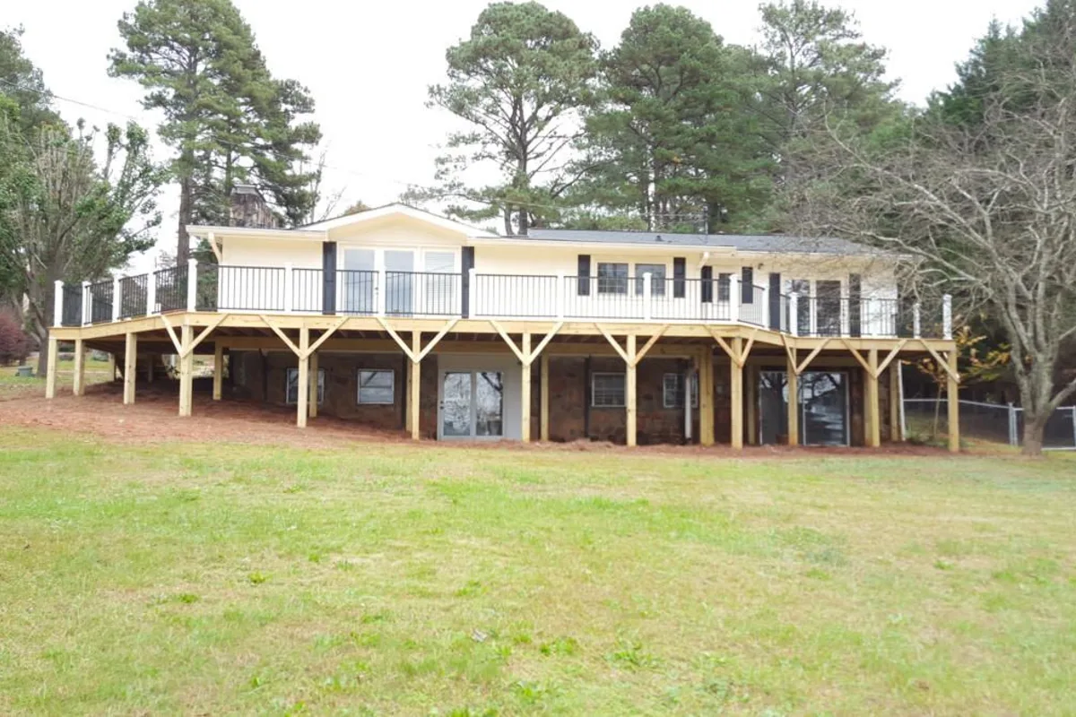 Custom wood pergola and deck built by 4 Seasons