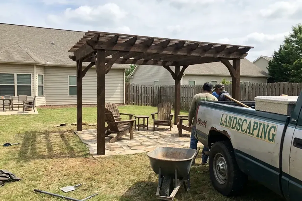 Stained pergola with outdoor seating