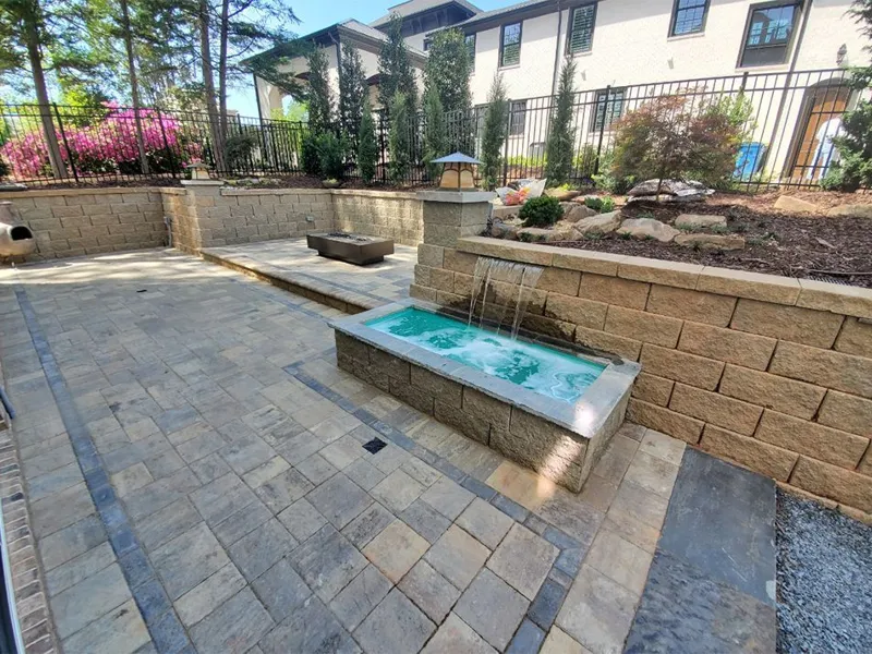 Paver patio with seating wall by 4 Seasons in the North Atlanta metro