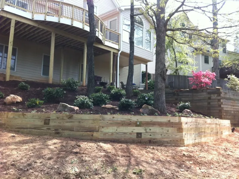 Boulder retaining wall and plantings by 4 Seasons in the North Atlanta metro