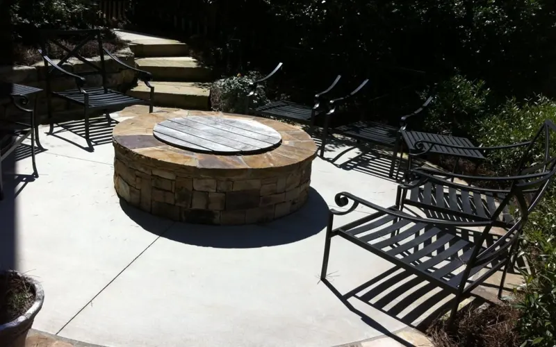 Circular paver fire pit patio by 4 Seasons